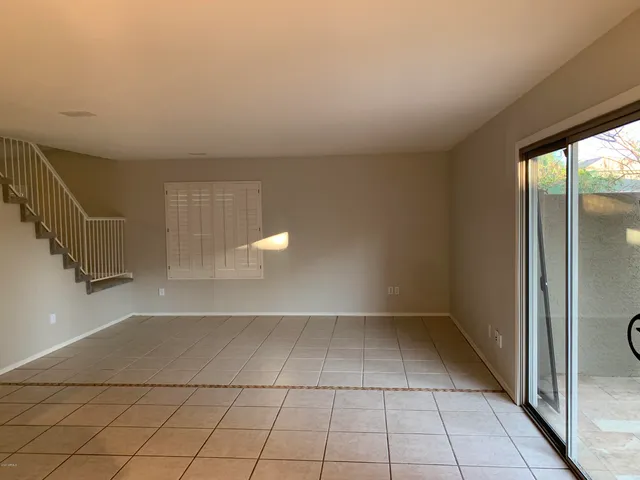 a view of an empty room and window