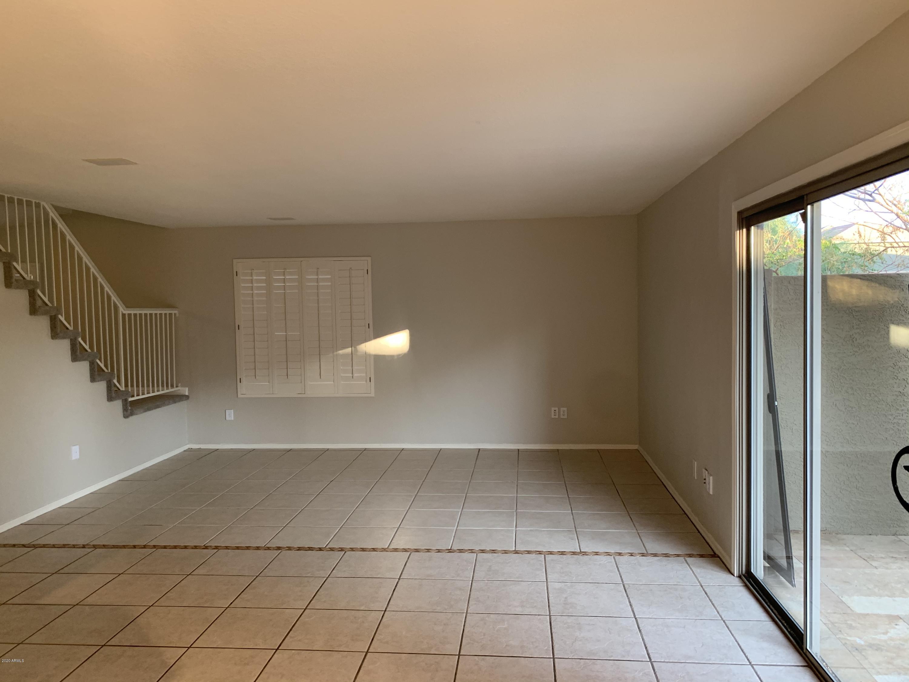 21842 North 40th Place Phoenix, AZ 85050 - Photo 9 of 42 a view of an empty room and window