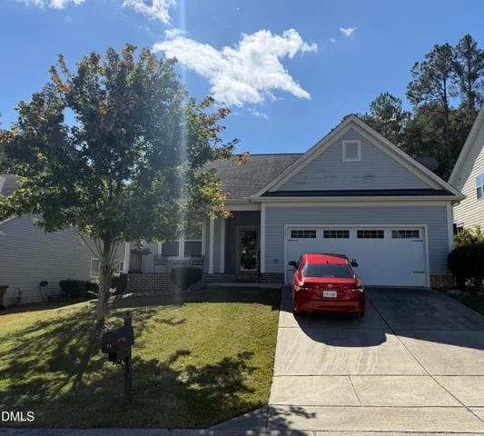 a car parked in front of a house