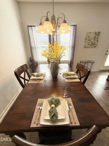 a view of a dining room with furniture