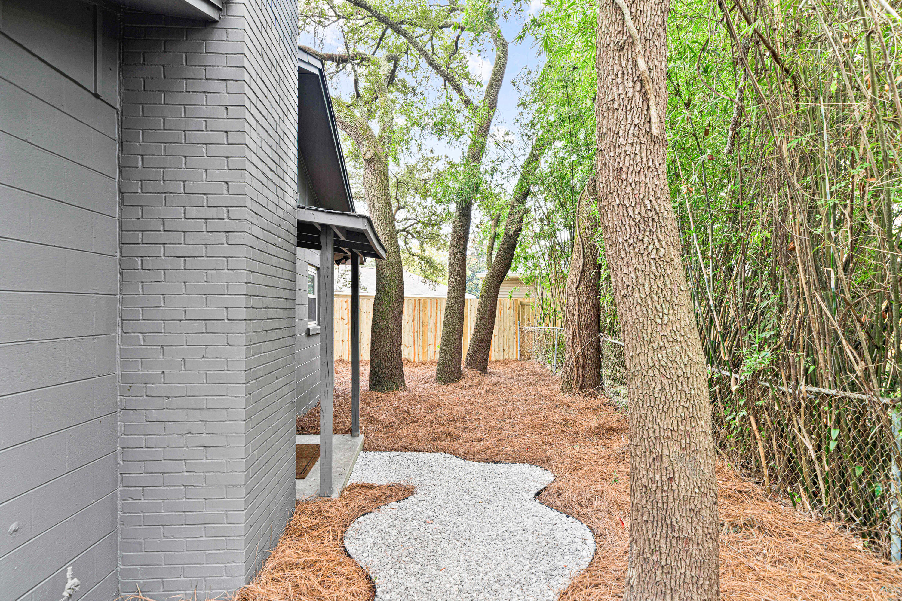 332 B Calhoun Avenue Destin, FL 32541 - Photo 17 of 23 a house view with a backyard space