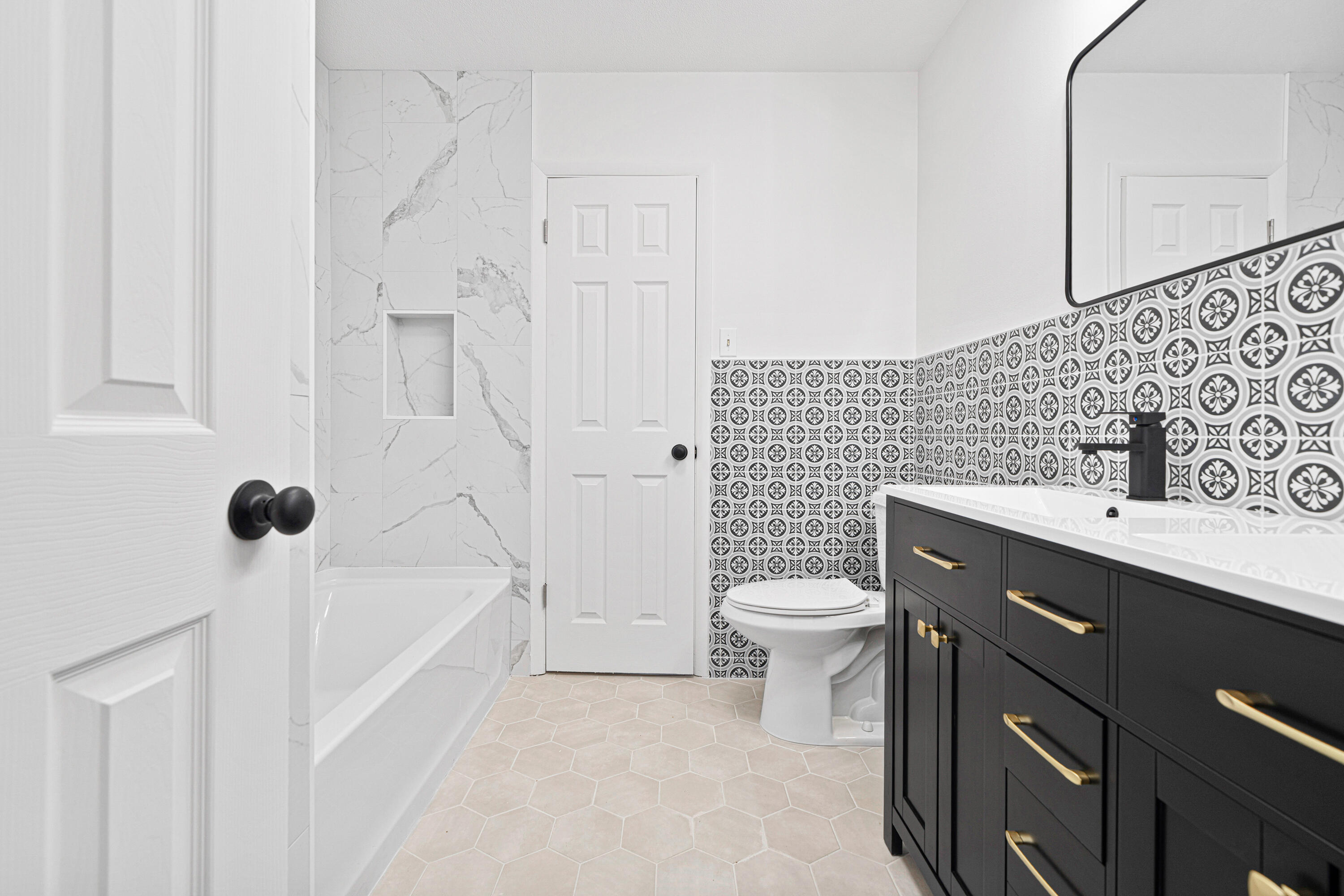332 B Calhoun Avenue Destin, FL 32541 - Photo 17 of 23 a bathroom with a sink a toilet and shower