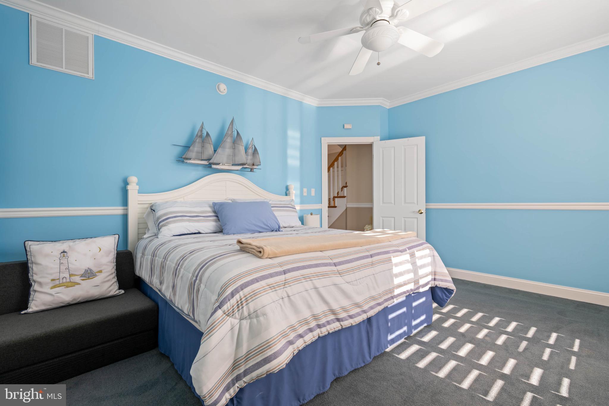 12959 Harbor Road Ocean City, MD 21842 - Photo 35 of 85 a bedroom with bed and window