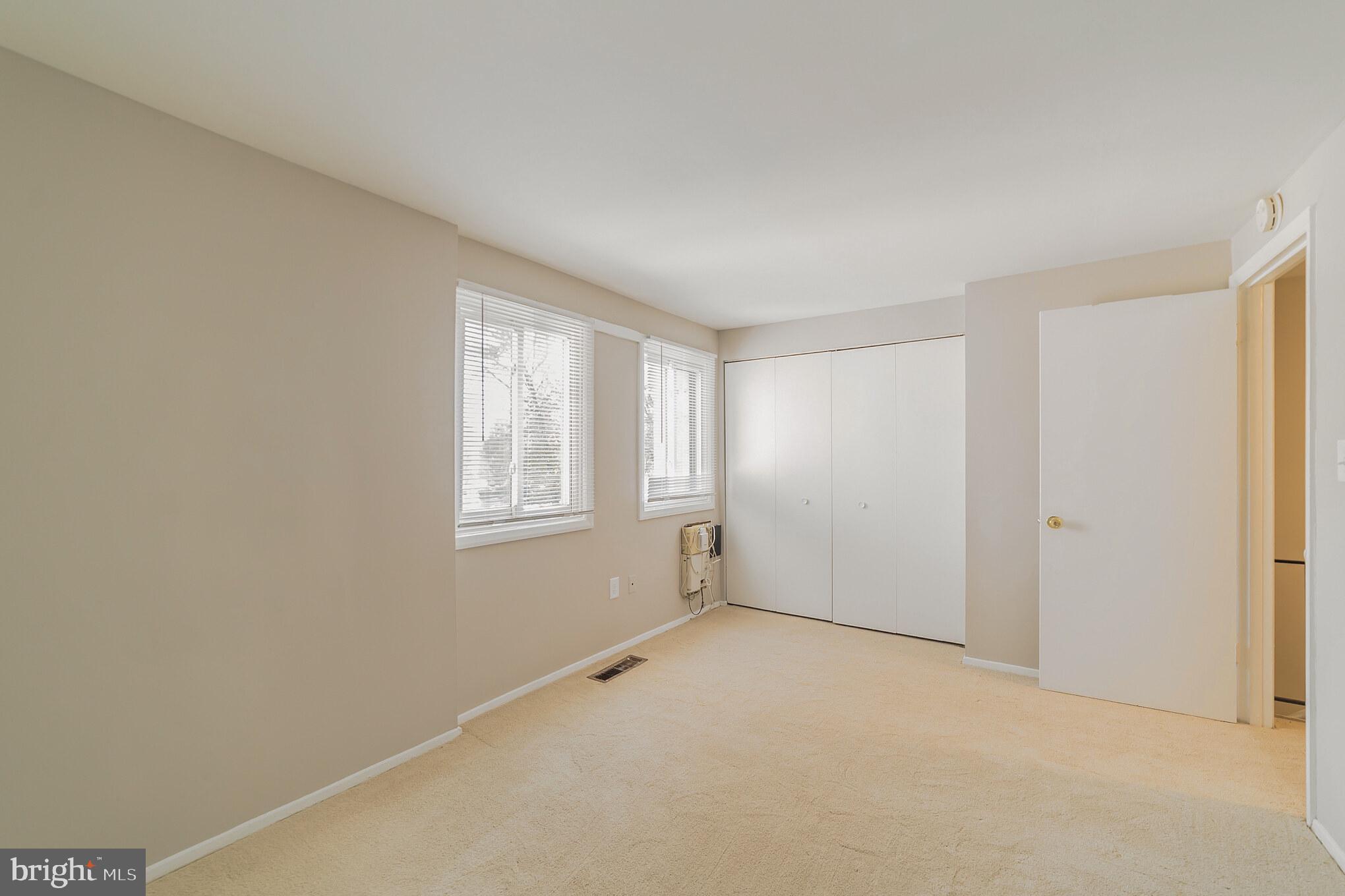 9349 Reader Lane Columbia, MD 21045 - Photo 14 of 32 a view of an empty room with a window