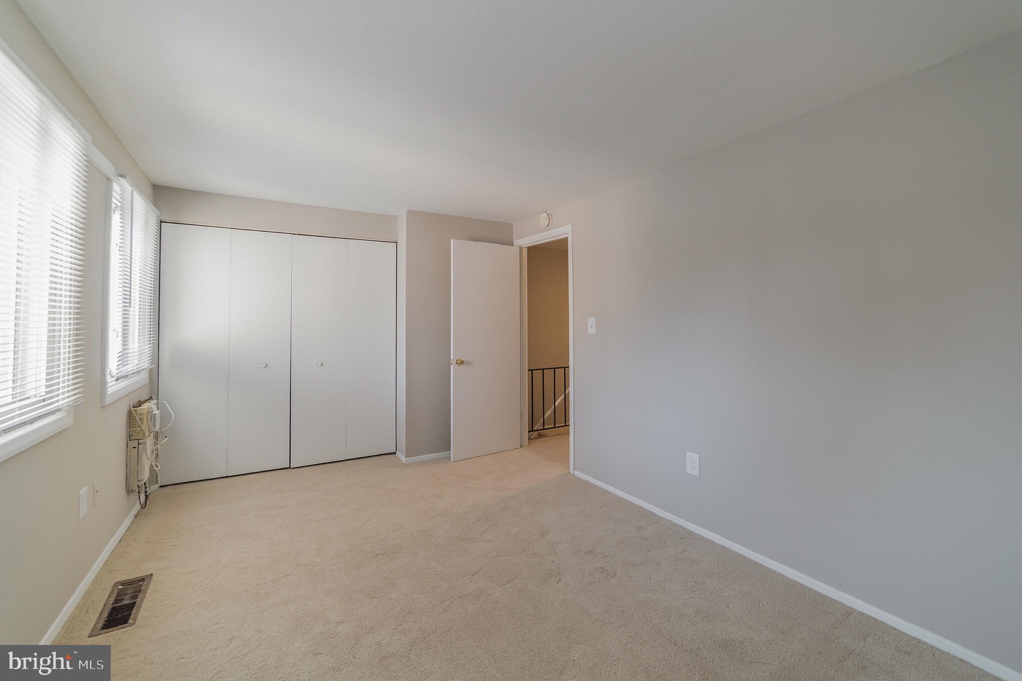 9349 Reader Lane Columbia, MD 21045 - Photo 16 of 32 a view of an empty room and a window