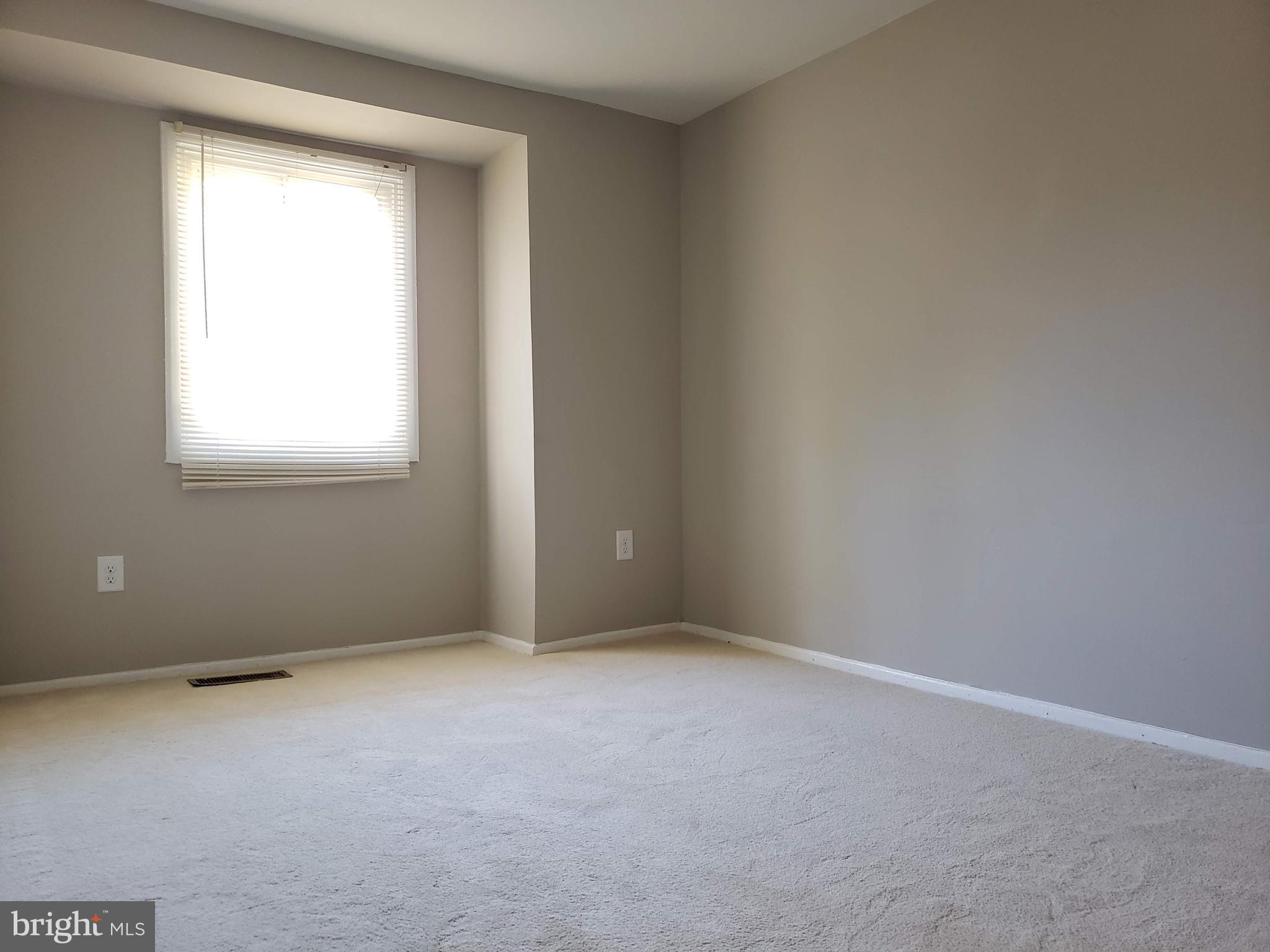 9349 Reader Lane Columbia, MD 21045 - Photo 20 of 32 an empty room with a window