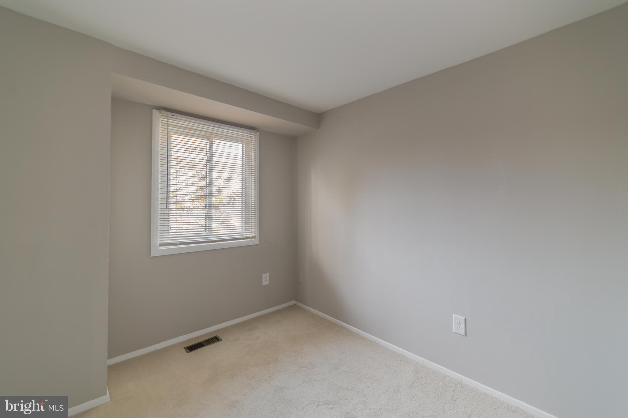 9349 Reader Lane Columbia, MD 21045 - Photo 23 of 32 an empty room with a window