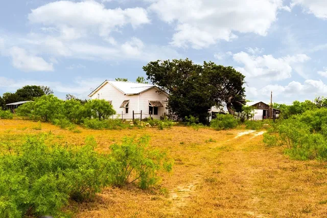a house view with a lake view