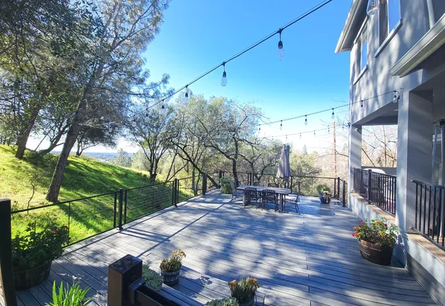 a view of yard with patio