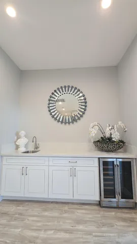 a bedroom with a bed couch and a window