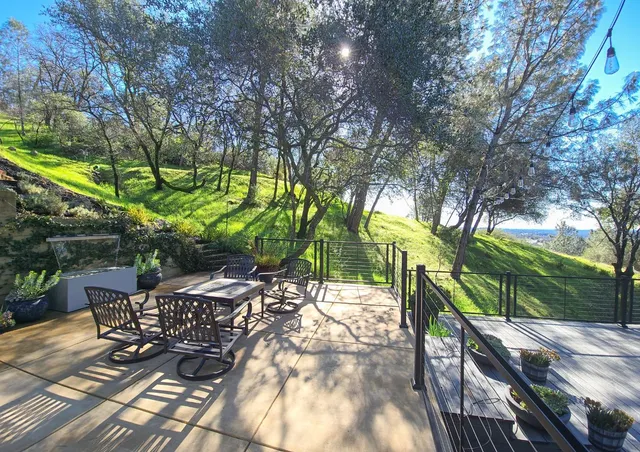 a view of a porch with wooden floor and outdoor space