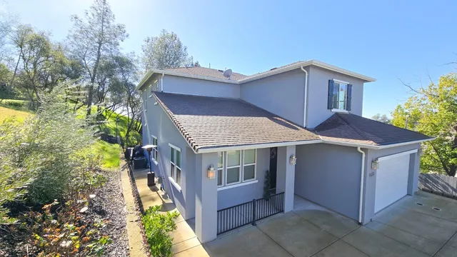 a house view with a garden space