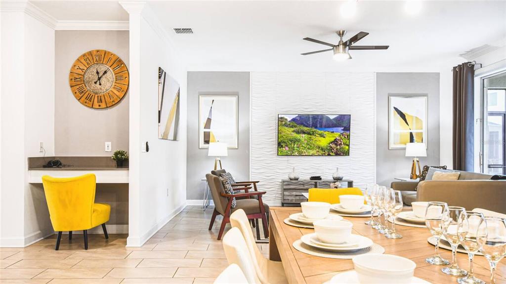 2936 Protagonist Street Kissimmee, FL 34746 - Photo 8 of 53 a view of a dining room with furniture and a mirror