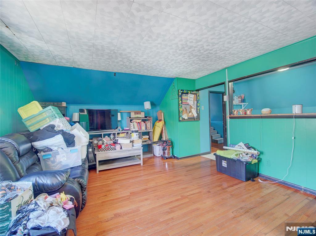 416 Jerusalem Road Scotch Plains, NJ 07076 - Photo 11 of 26 a bedroom with furniture and a wooden floor