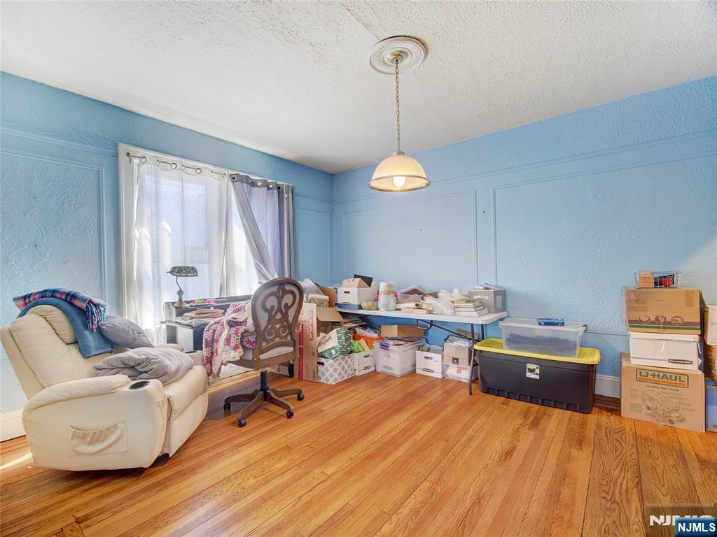 416 Jerusalem Road Scotch Plains, NJ 07076 - Photo 21 of 26 a living room with furniture and a wooden floor