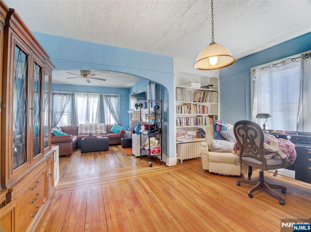 416 Jerusalem Road Scotch Plains, NJ 07076 - Photo 23 of 26 a living room with furniture and a wooden floor
