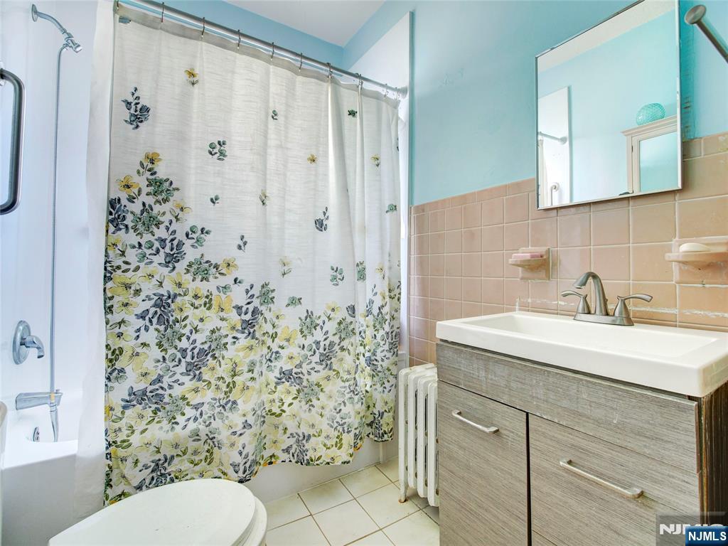 416 Jerusalem Road Scotch Plains, NJ 07076 - Photo 24 of 26 a bathroom with a sink toilet and shower