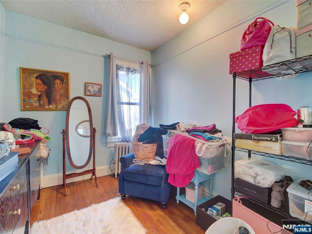 416 Jerusalem Road Scotch Plains, NJ 07076 - Photo 25 of 26 a living room with furniture and a bathroom