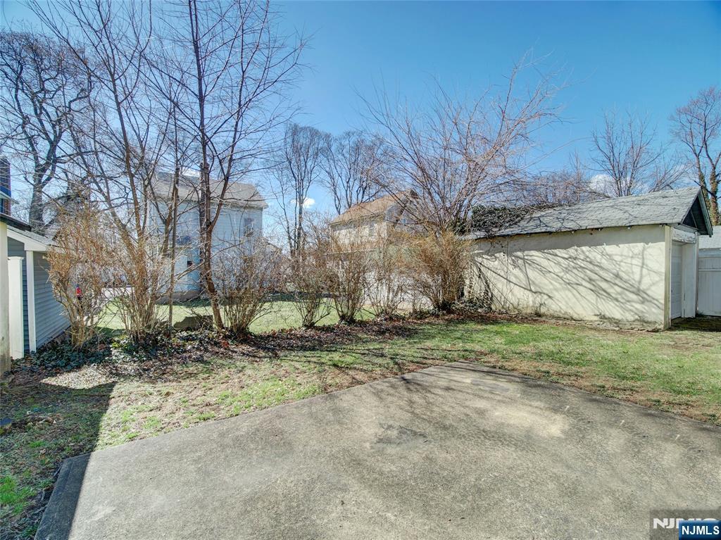 416 Jerusalem Road Scotch Plains, NJ 07076 - Photo 5 of 26 a view of a house with a yard