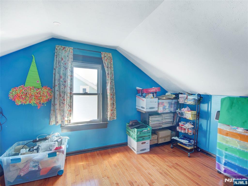 416 Jerusalem Road Scotch Plains, NJ 07076 - Photo 7 of 26 a living room with furniture and a wooden floor