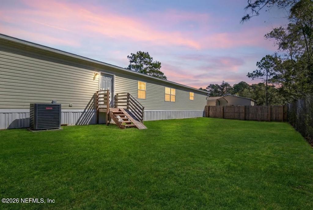 13003 Sawpit Road Jacksonville, FL 32226 - Photo 42 of 66 Fenced backyard - grass enhanced