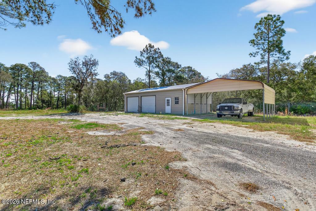 13003 Sawpit Road Jacksonville, FL 32226 - Photo 44 of 66 Garage and carport