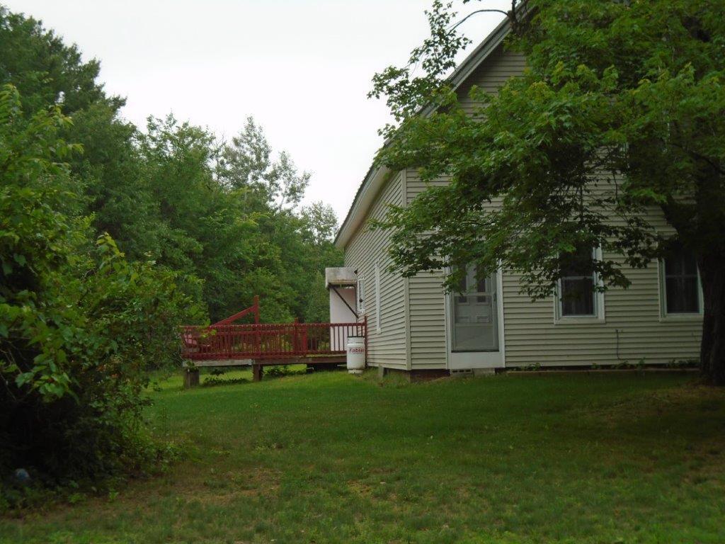 149 River Road Benton, ME 04901 - Photo 25 of 26 Front of House and Deck