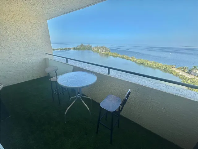 a view of a room with a table and chair