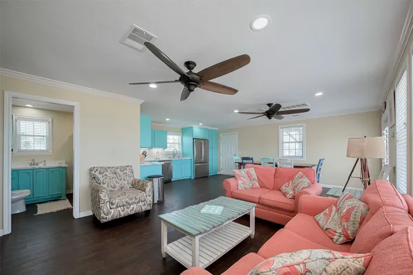 a bedroom with a bed and a chair