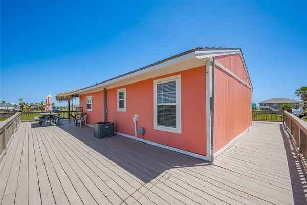 a porch with seating space and yard