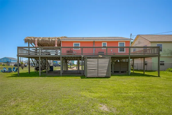 a front view of a building with garden
