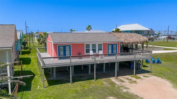 aerial view of a house with a garden