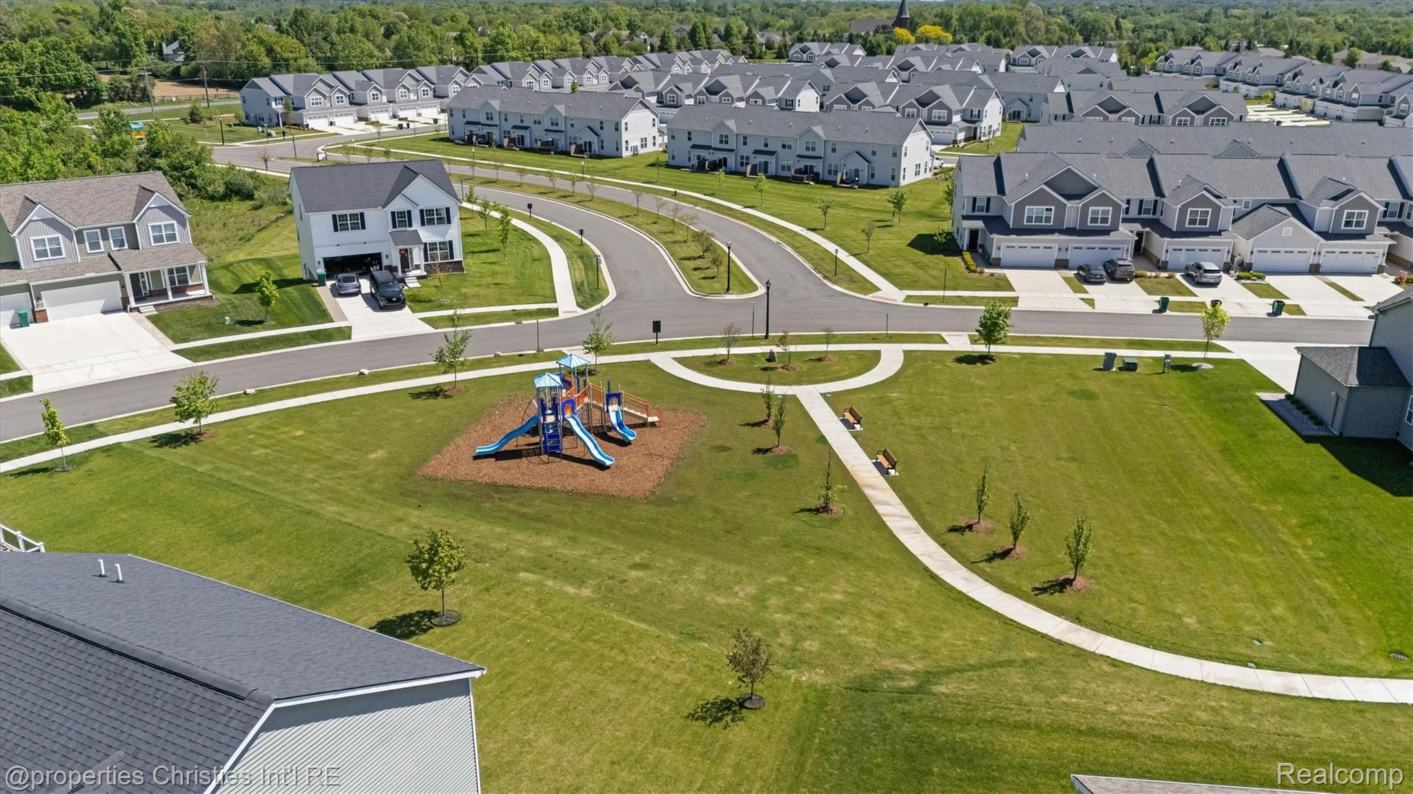 2721 Maize Loop Saline, MI 48176 - Photo 47 of 52 Aerial perspective of suburban area with a community park