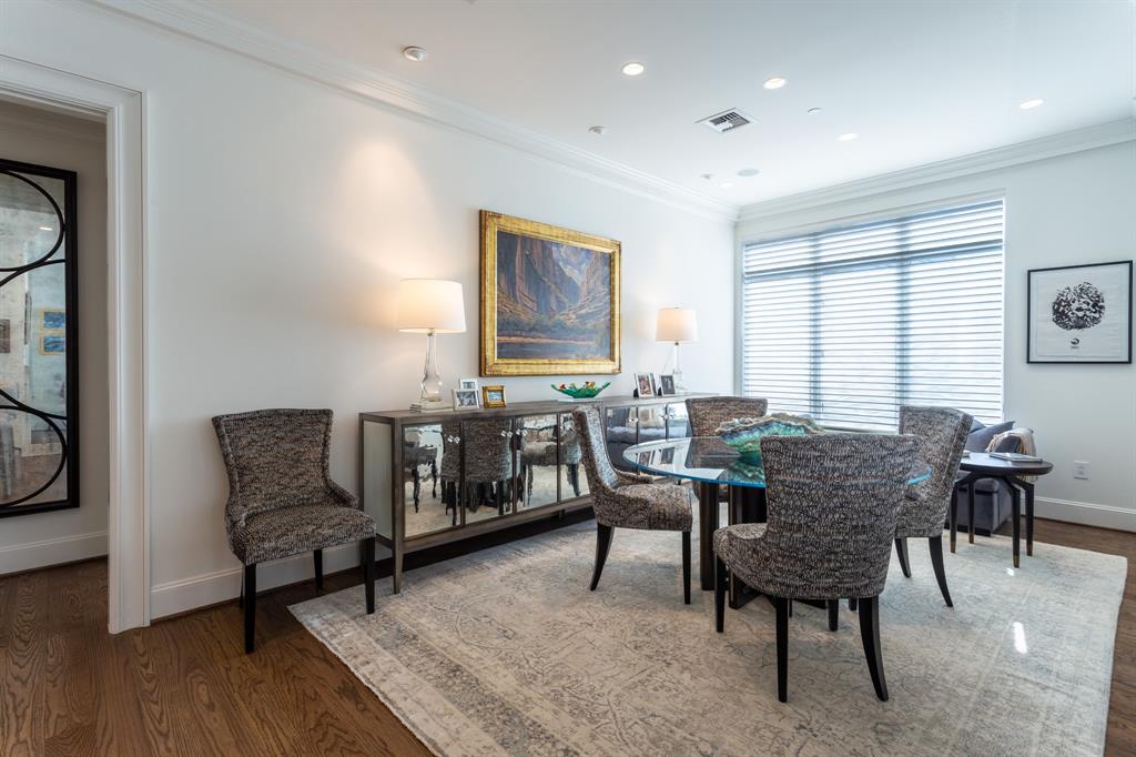 2525 North Pearl Street, Unit 1005 Dallas, TX 75201 - Photo 15 of 40 a dining room with furniture and wooden floor