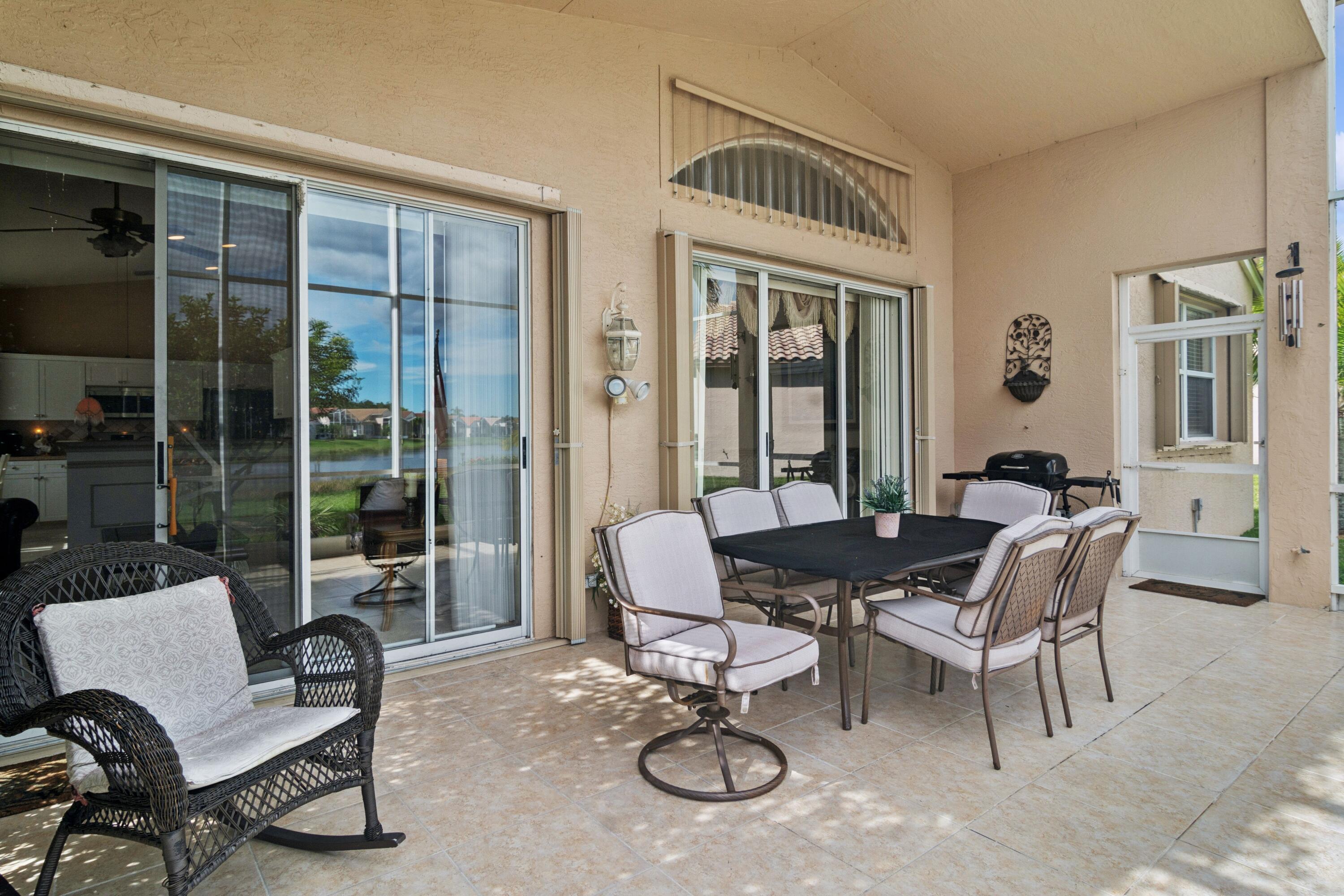 370 Springview Loop Port St. Lucie, FL 34986 - Photo 17 of 59 17_370NWSpringviewLoop_85_Patio_HiRes -