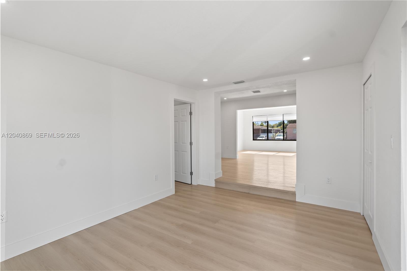 31 West 64th Street Hialeah, FL 33012 - Photo 28 of 49 a view of empty room with wooden floor