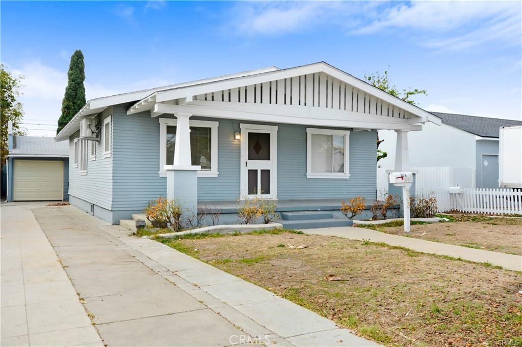 833 South Lemon Street, Unit A Anaheim, CA 92805 - Photo 1 of 1 a front view of a house with a yard