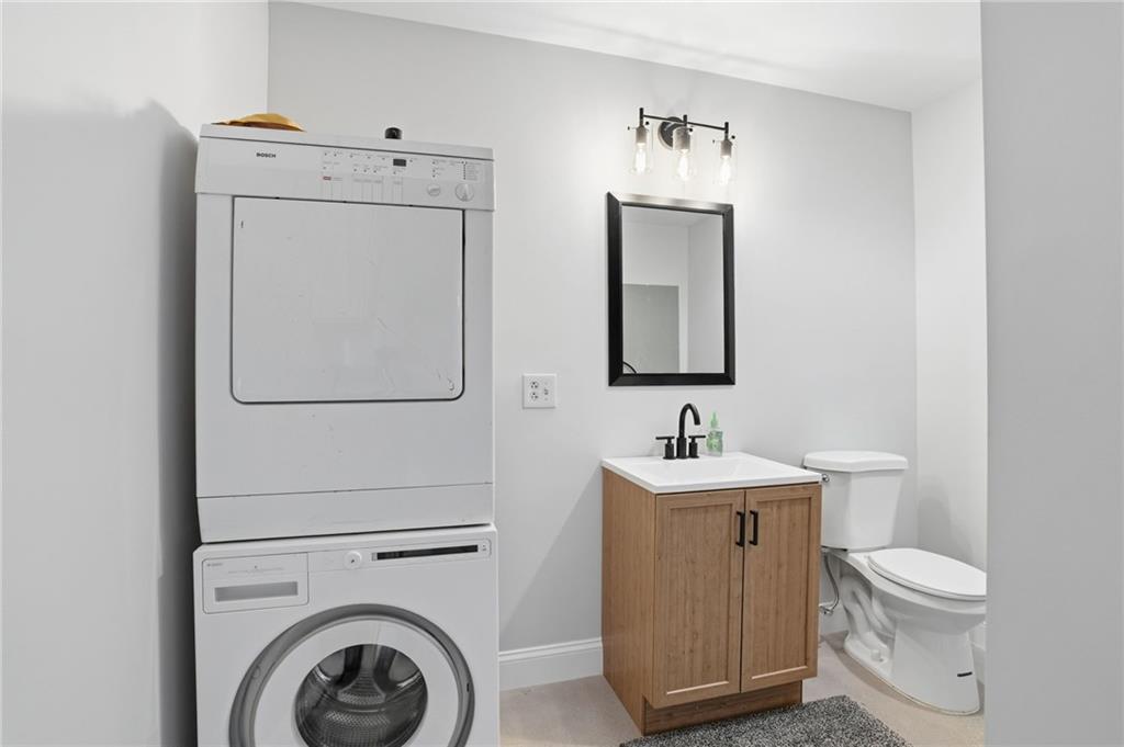 3326 Monument Road Jasper, GA 30143 - Photo 30 of 49 a bathroom with a sink mirror and toilet