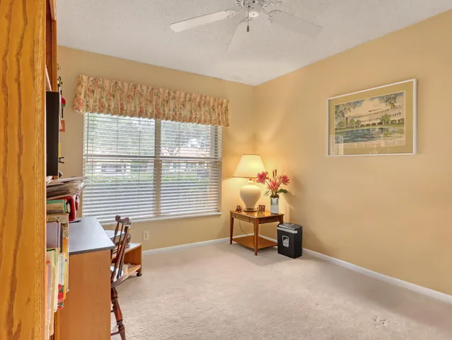a view of a livingroom with furniture and toys