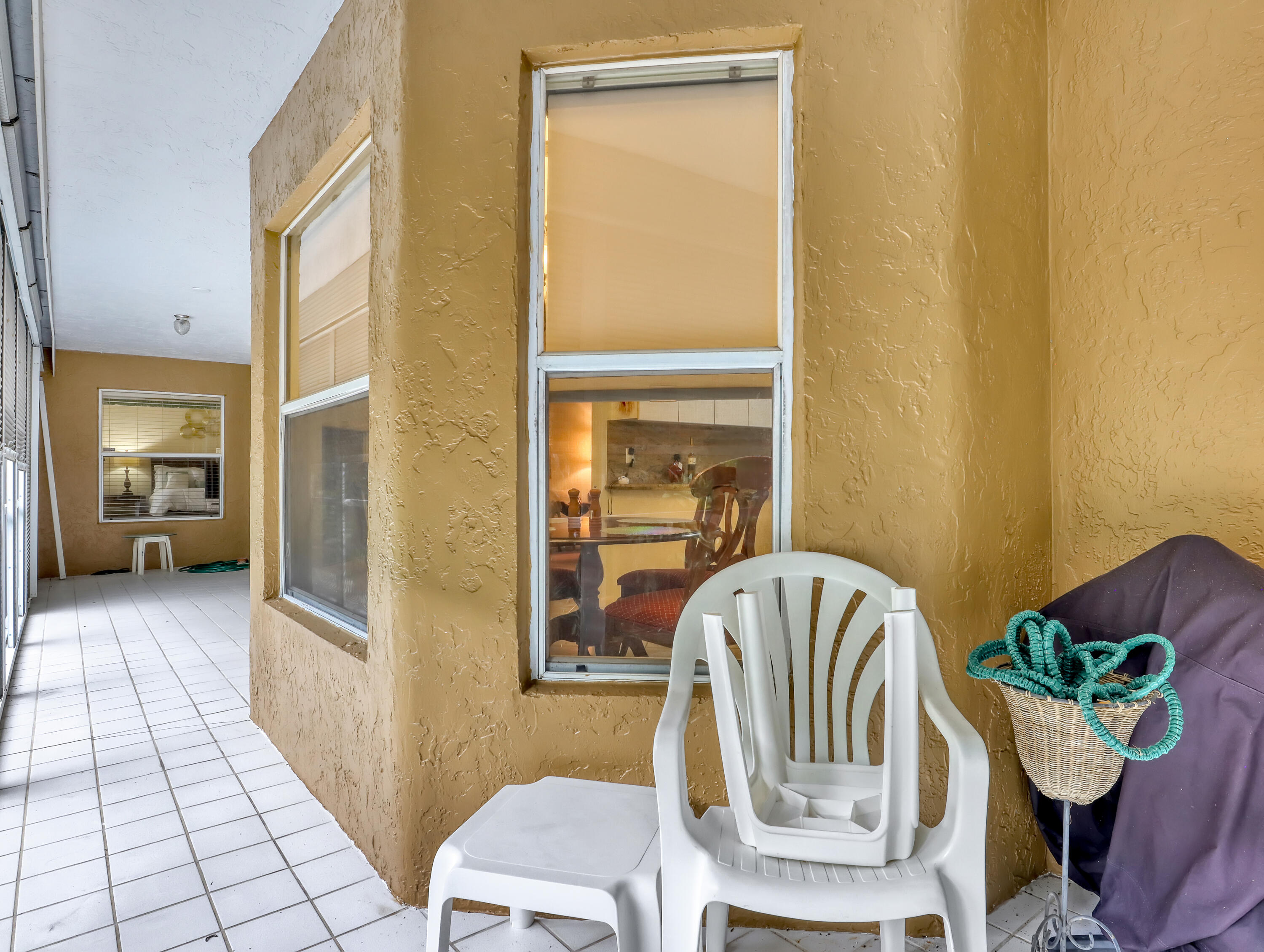 712 Golf Court Delray Beach, FL 33445 - Photo 34 of 46 a bedroom with a bed and wooden floor