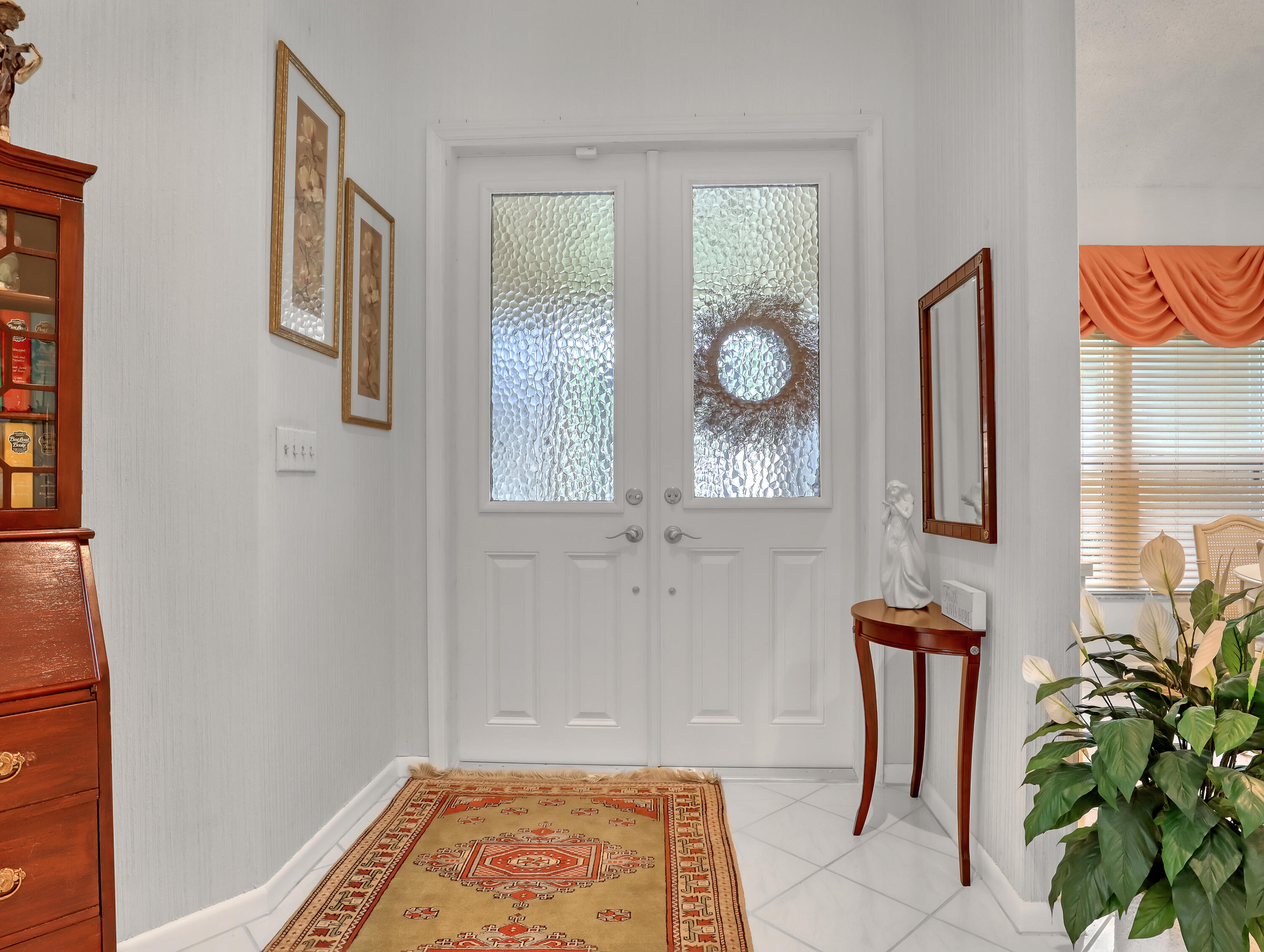 712 Golf Court Delray Beach, FL 33445 - Photo 6 of 46 a bathroom with a sink and a mirror