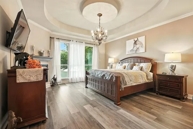 a bedroom with bed and window