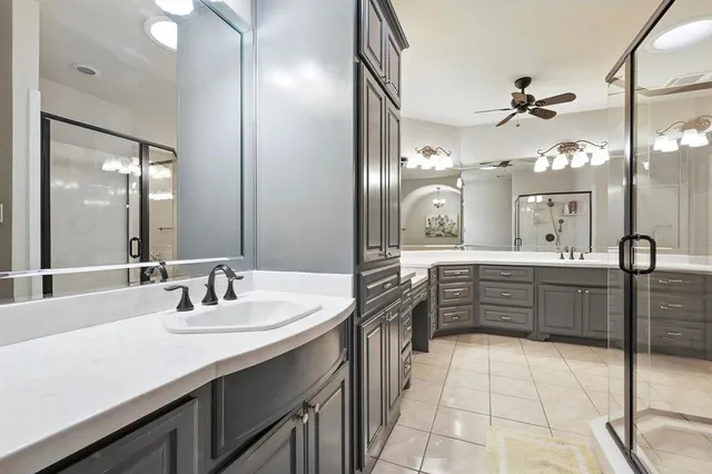 a kitchen with a sink and cabinets