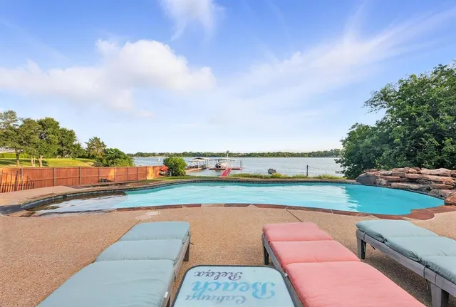 a view of a yard and ocean view