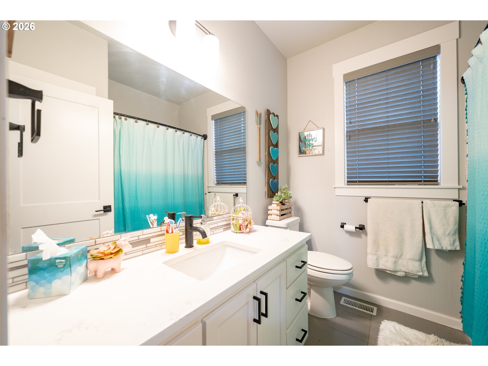459 Northeast Cedar Street Sublimity, OR 97385 - Photo 17 of 27 a bathroom with a sink double vanity and a mirror