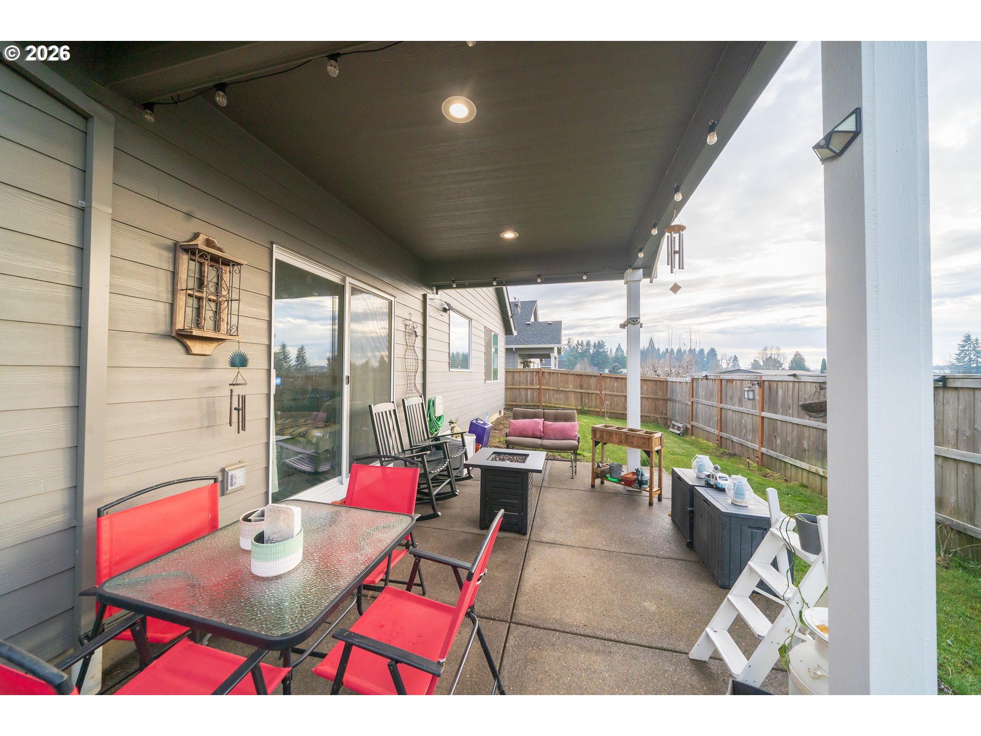 459 Northeast Cedar Street Sublimity, OR 97385 - Photo 23 of 27 a living room with patio furniture and a potted plant