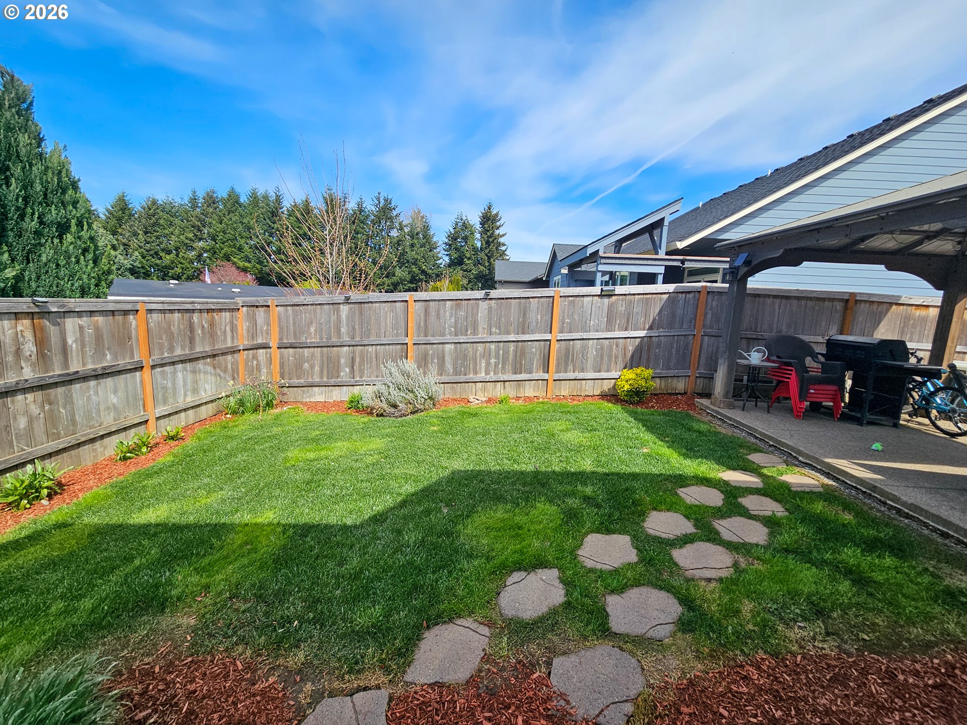 459 Northeast Cedar Street Sublimity, OR 97385 - Photo 28 of 28 a view of a backyard with a garden
