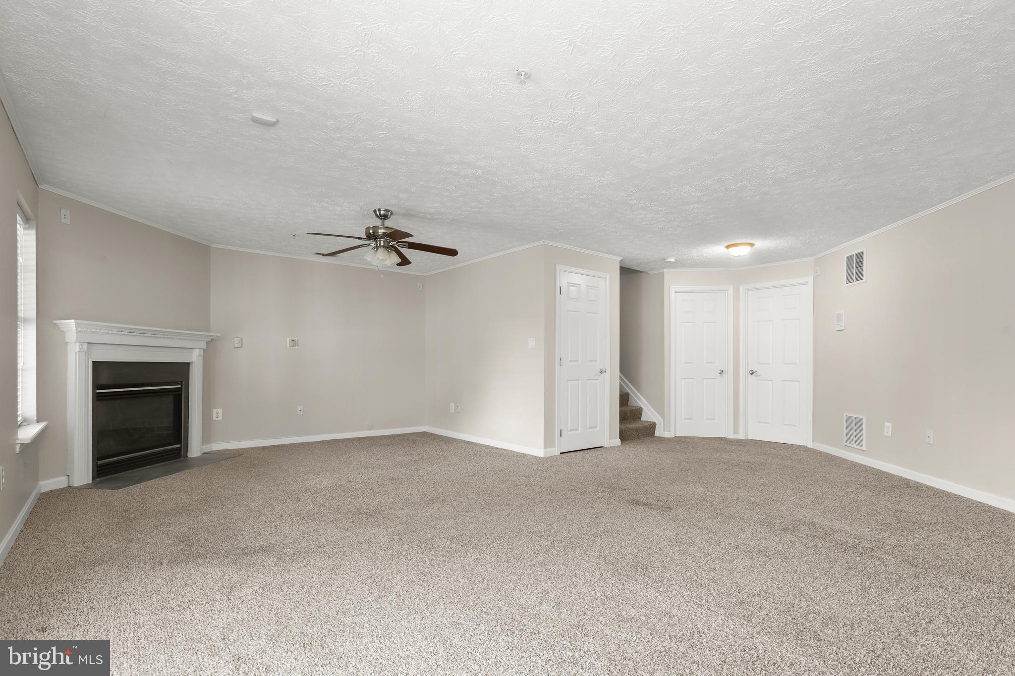1983 Cullen Way Forest Hill, MD 21050 - Photo 35 of 50 wooden floor in an empty room with a ceiling fan