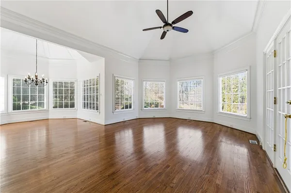 a view of kitchen and wooden floor