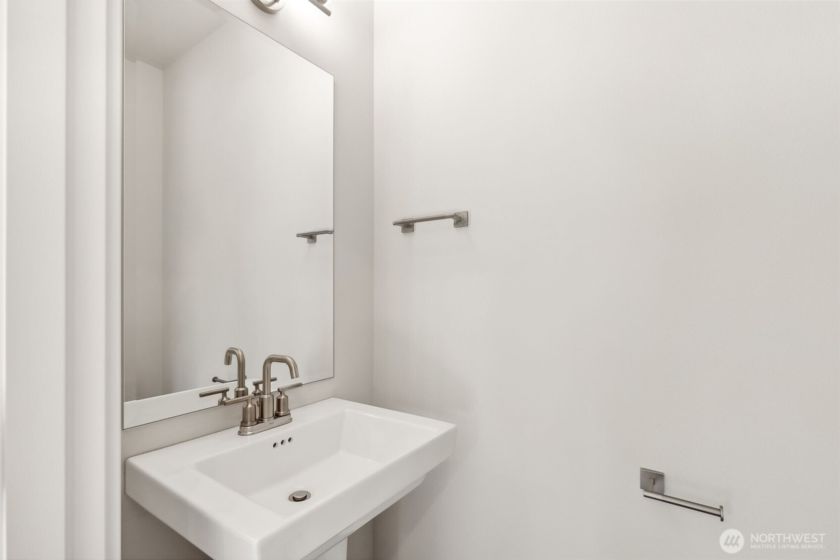 32321 134th Street Southeast Sultan, WA 98294 - Photo 12 of 27 a bathroom with a sink and a mirror